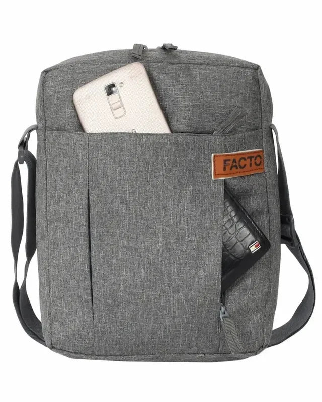 Grey crossbody bag with phone and wallet in front pockets, featuring FACTO brand patch