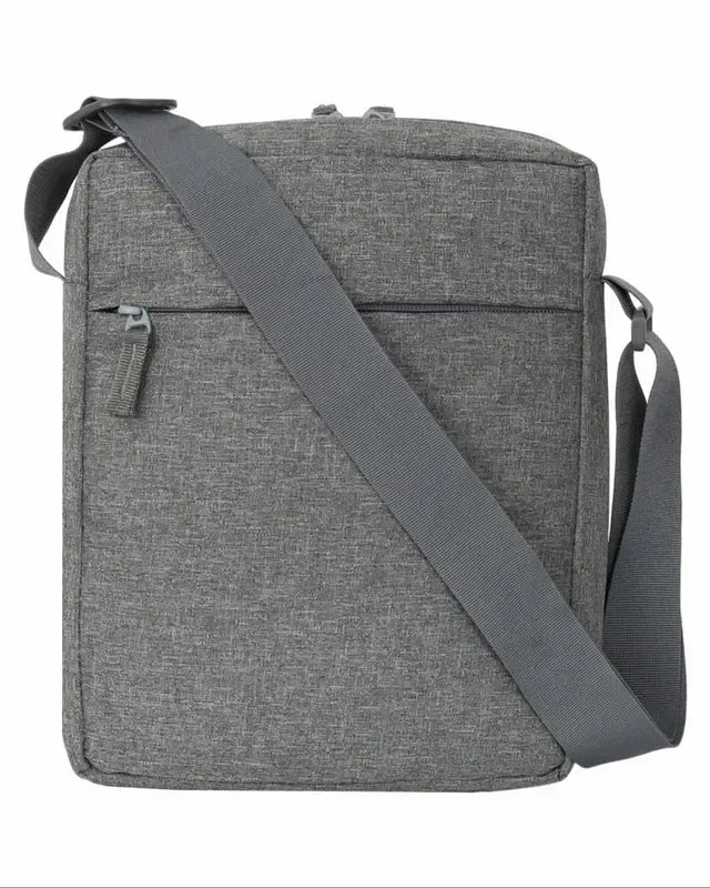 Gray textured crossbody bag with adjustable strap and front zipper pocket