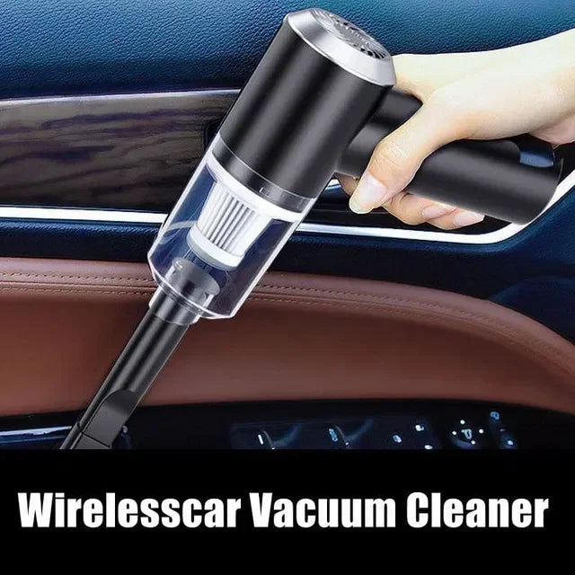 Hand holding wireless car vacuum cleaner cleaning dashboard, portable handheld suction for auto interior